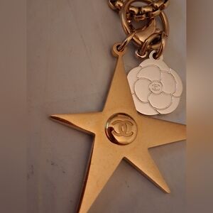 CHANEL Gold Star and Camellia Pendant Necklace
